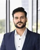 serious young ambitious indian businessman 260nw 2598795817 e1746060102741